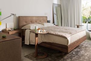 Letto float in noce con testiera in pelle naturale