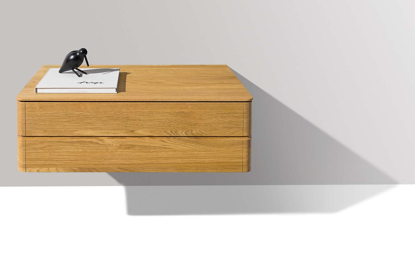 wall-mounted float bedside cabinet in oak