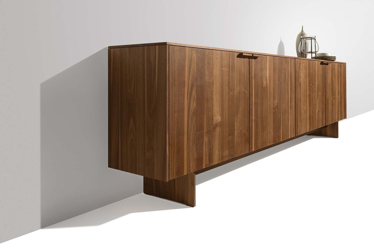 filigno sideboard with wooden panels in walnut from the side