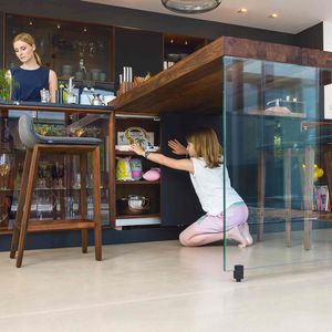 add-on table in walnut with glass side panel.