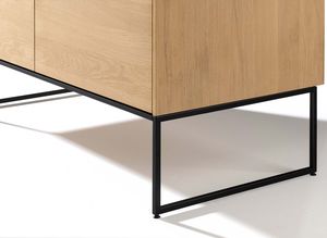 detailed view of the matt black metal frame base of the filigno writing desk