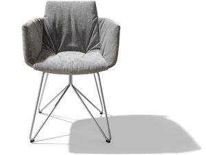 grand lui upholstered chair with armrests and striking folds by TEAM 7 