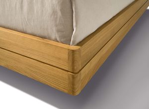 float wood bed with rounded corners