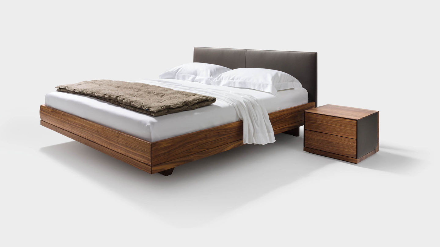 riletto wood bed with leather headboard