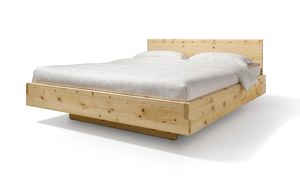 Letto nox in legno massello con testiera in cembro