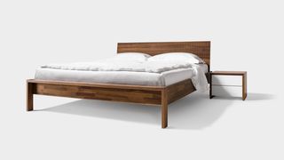 lunetto wooden bed in walnut