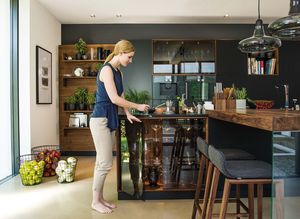 black line kitchen of solid wood with glass cabinet