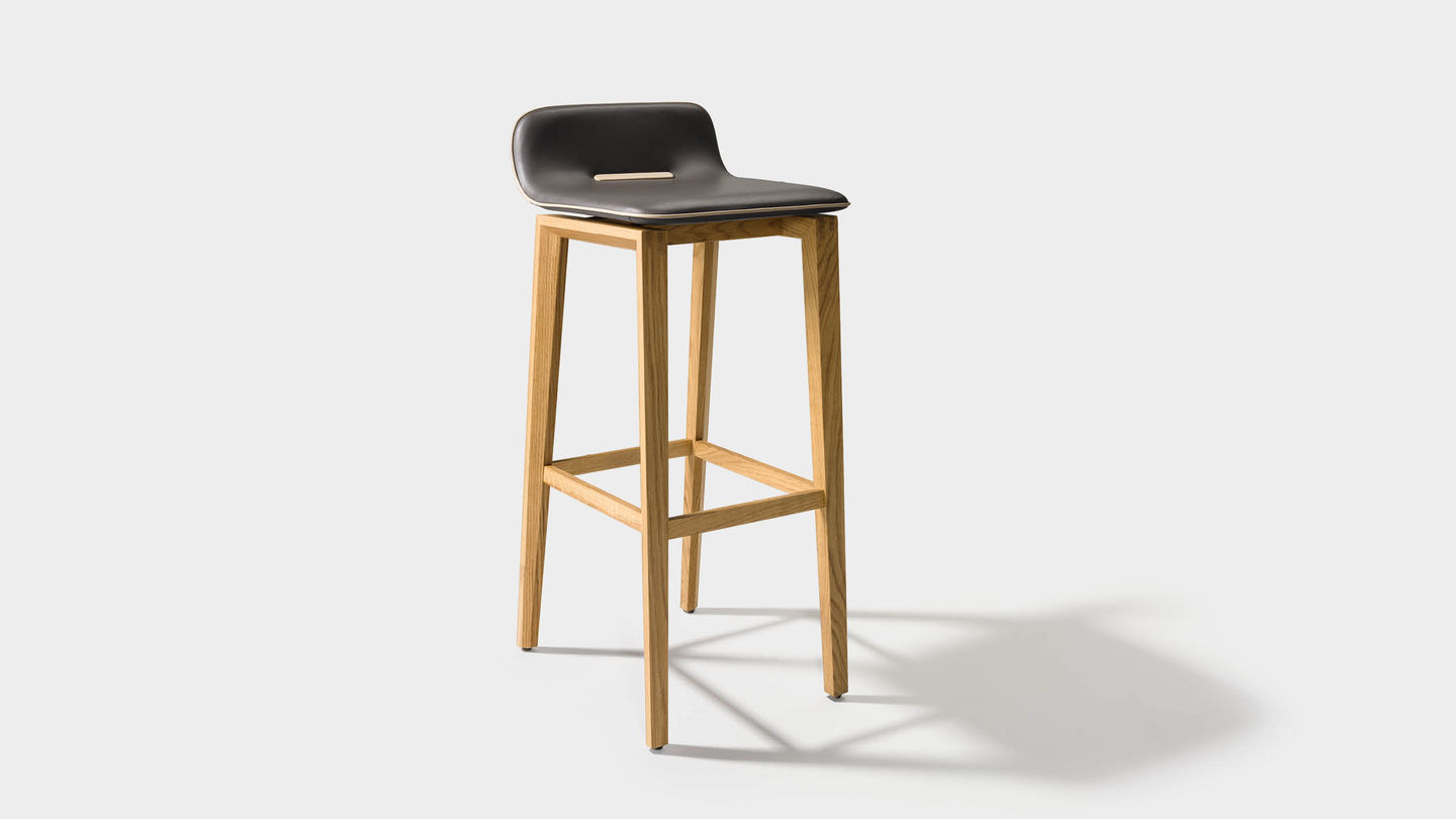 ark bar stool in leather with wooden legs in oak