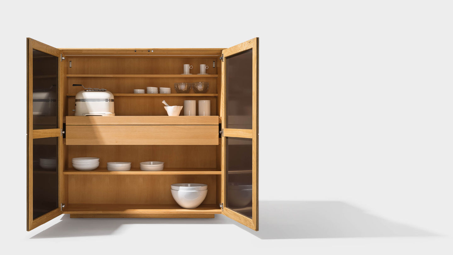 filigno highboard interior with doors and ceramic surface